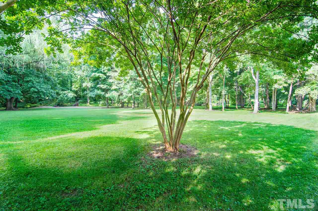 2001 Longwood Drive Raleigh, NC 27612 - Photo 14 of 25 a huge green field with lots of trees