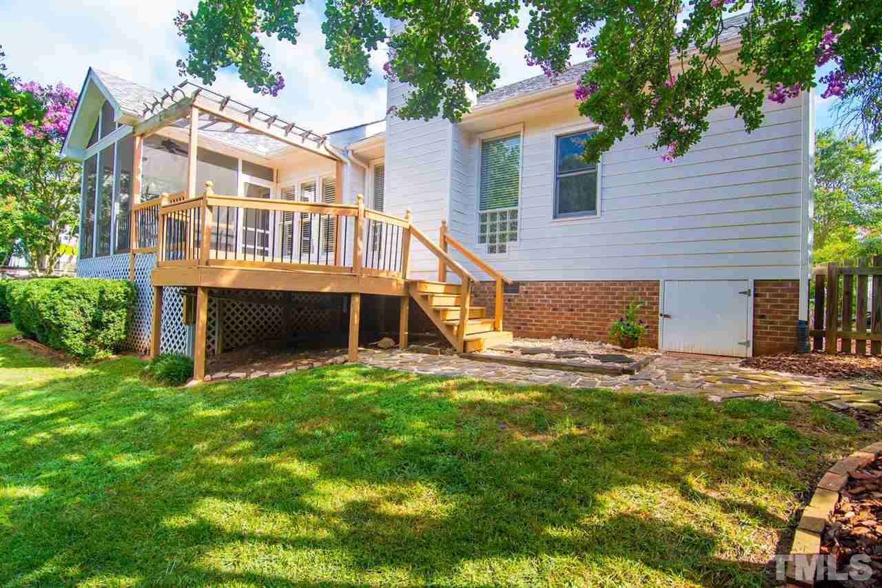 2001 Longwood Drive Raleigh, NC 27612 - Photo 15 of 25 a view of a house with a yard and sitting area