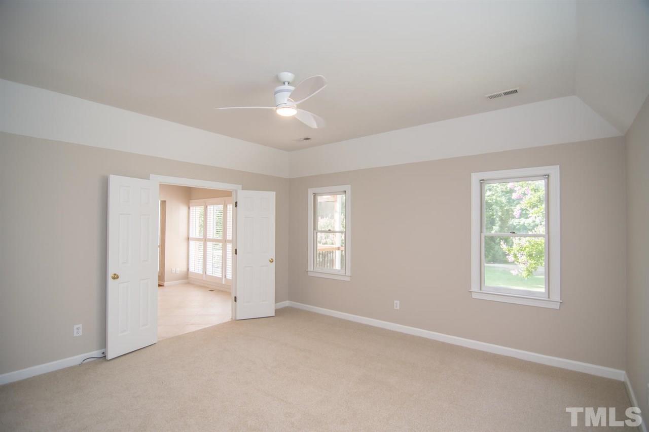 2001 Longwood Drive Raleigh, NC 27612 - Photo 18 of 25 a view of an empty room with a window