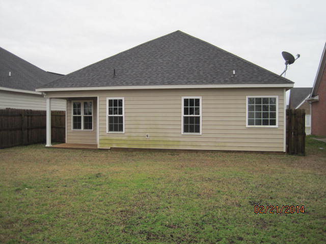419 Bob White Road Macon, GA 31216 - Photo 2 of 13 a backyard of a house