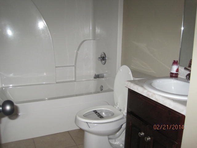 419 Bob White Road Macon, GA 31216 - Photo 12 of 13 a bathroom with a sink a toilet and shower