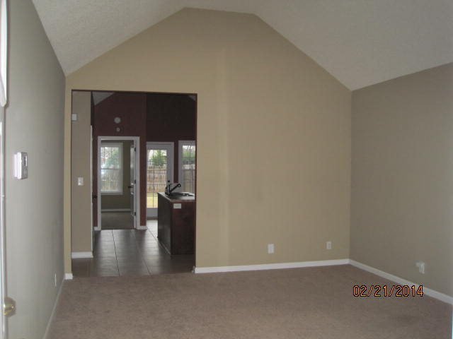 419 Bob White Road Macon, GA 31216 - Photo 4 of 13 a view of a hallway with wooden shelves