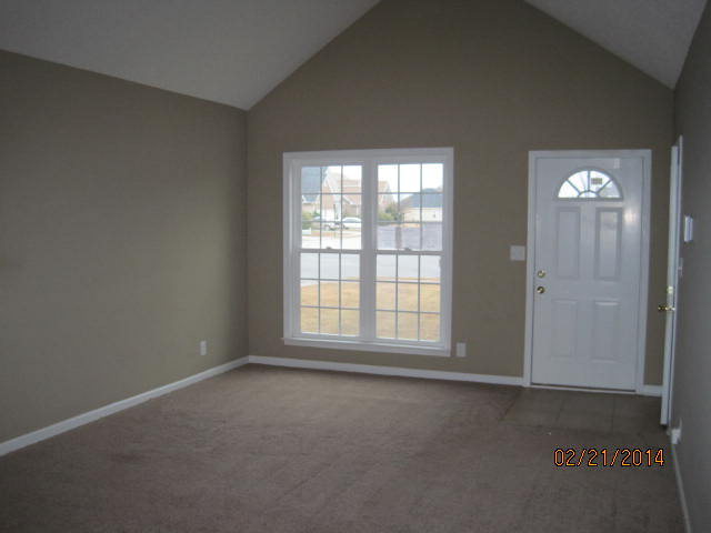 419 Bob White Road Macon, GA 31216 - Photo 5 of 13 an empty room with windows