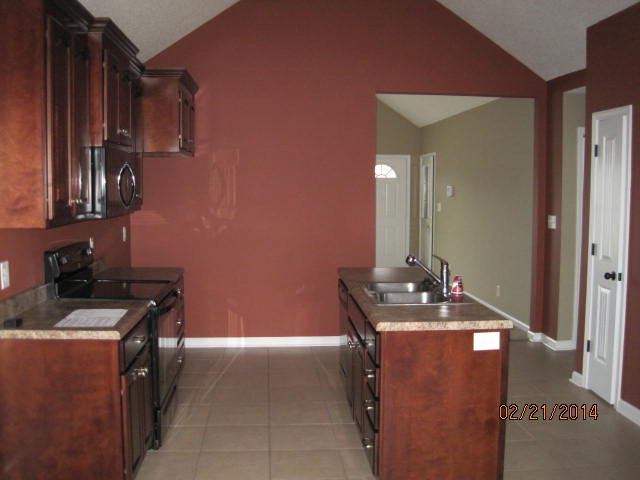 419 Bob White Road Macon, GA 31216 - Photo 7 of 13 a utility room with cabinets
