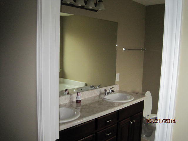 419 Bob White Road Macon, GA 31216 - Photo 9 of 13 a bathroom with a sink and a mirror