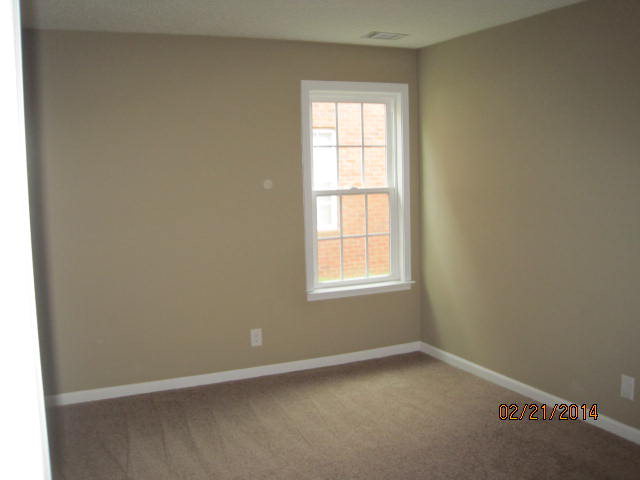 419 Bob White Road Macon, GA 31216 - Photo 10 of 13 an empty room with a window