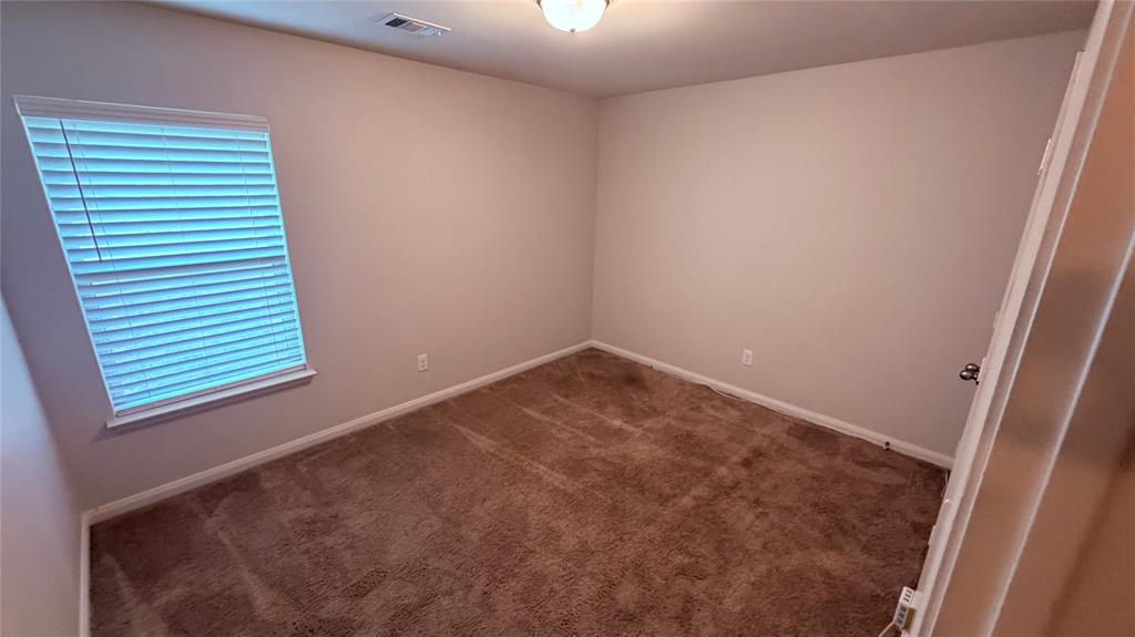 1601 Conley Lane Crowley, TX 76036 - Photo 9 of 17 an empty room with a window
