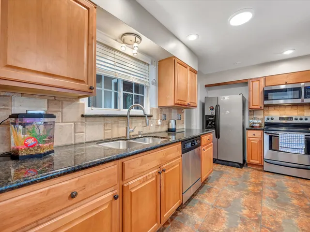a living room with furniture and a table
