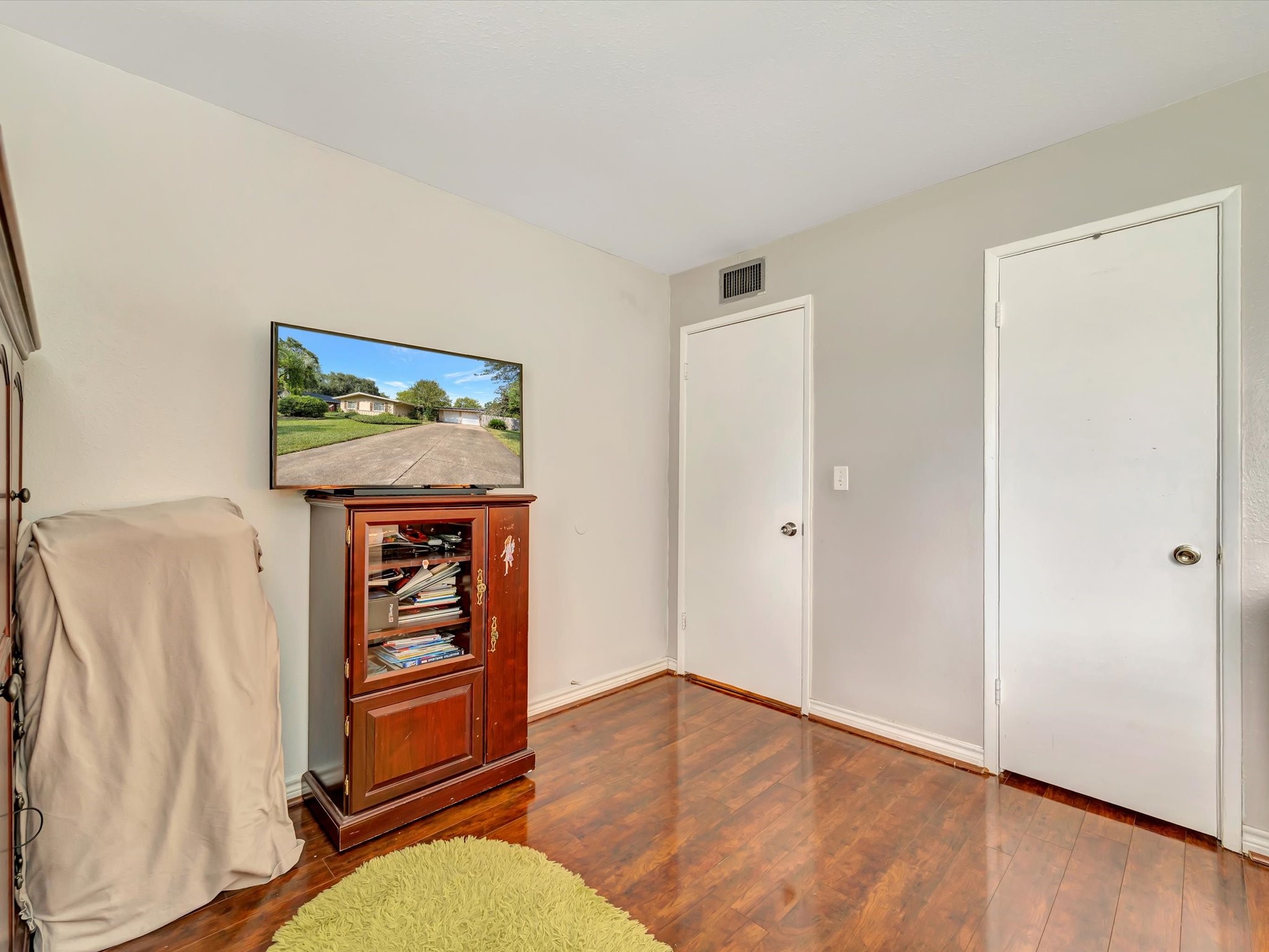 1615 Redway Lane Houston, TX 77062 - Photo 29 of 32 Bedroom 3 with laminate wood flooring