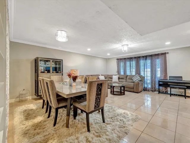 a living room with furniture and a table