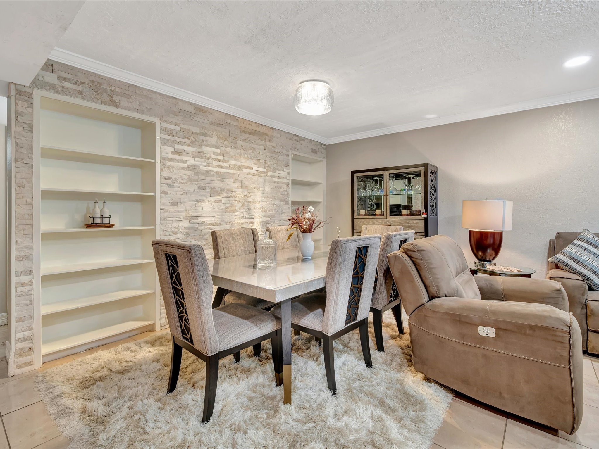 1615 Redway Lane Houston, TX 77062 - Photo 8 of 32 Dining area with gorgeous accent stone wall and built-ins