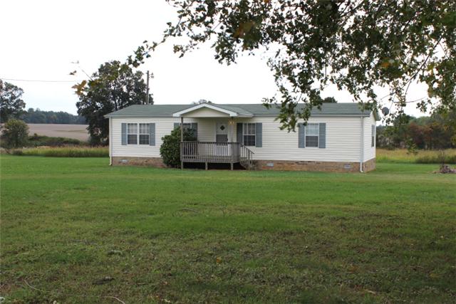 5173 Esbon Holland Road Springfield, TN 37172 - Photo 1 of 17 a front view of house with yard and green space