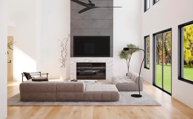 a living room with furniture a flat screen tv and a fireplace