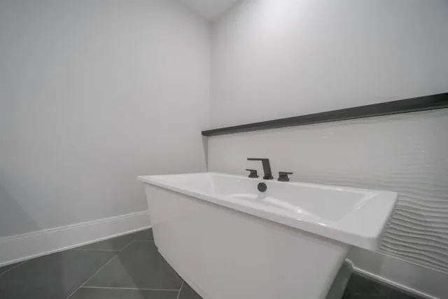 a close up of a sink in a bathroom