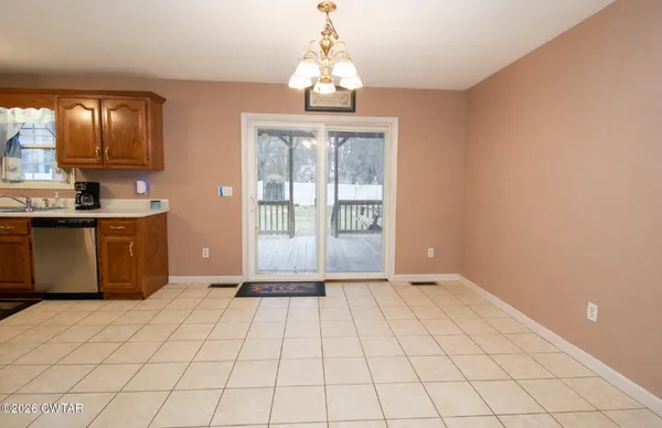 a view of an empty room and window