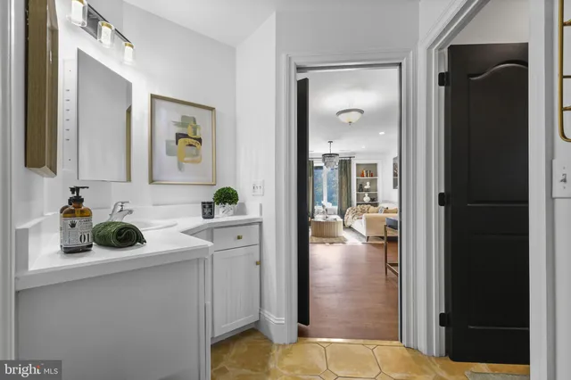 a view of a livingroom with furniture and a table