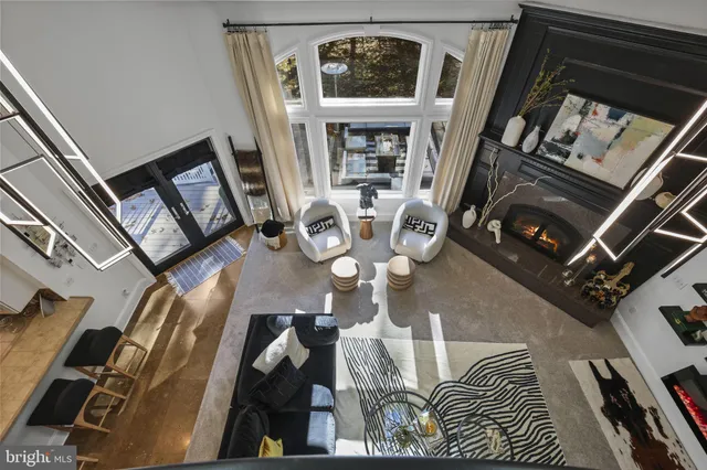 a bedroom with furniture and a wooden floor