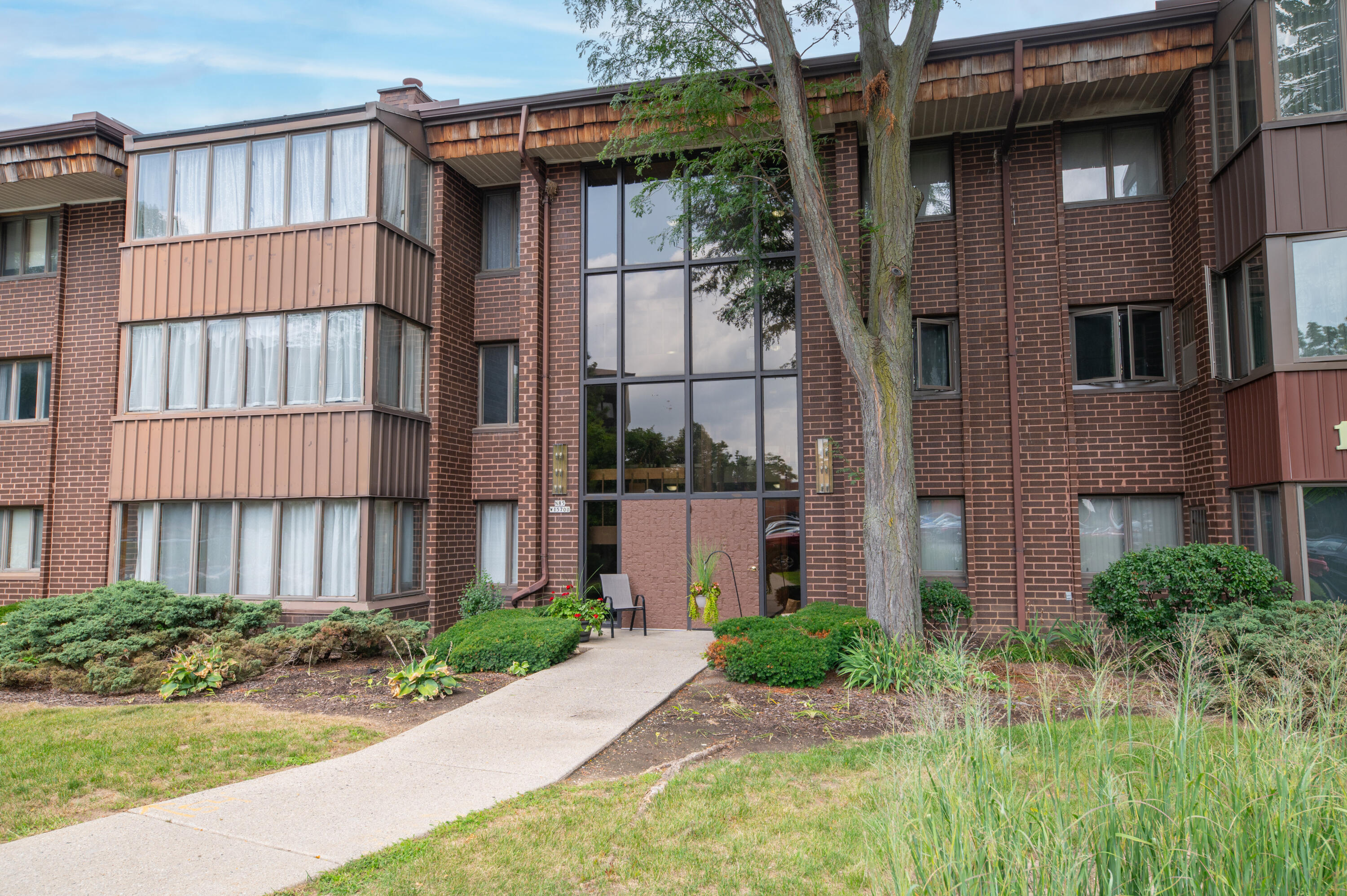 N85-w15700 Ridge Road, Unit 104 Menomonee Falls, WI 53051 - Photo 1 of 42 EUP_1029-Edit