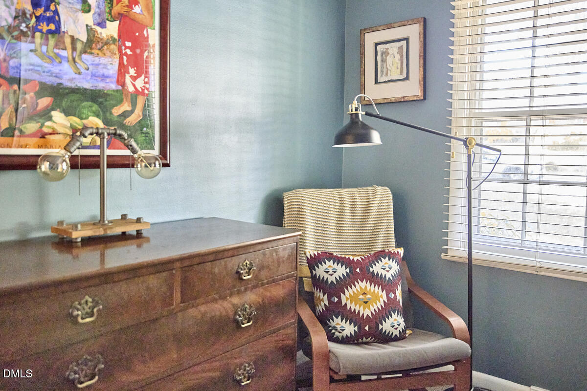 4916 Latimer Road Raleigh, NC 27609 - Photo 20 of 30 a living room with furniture and a window