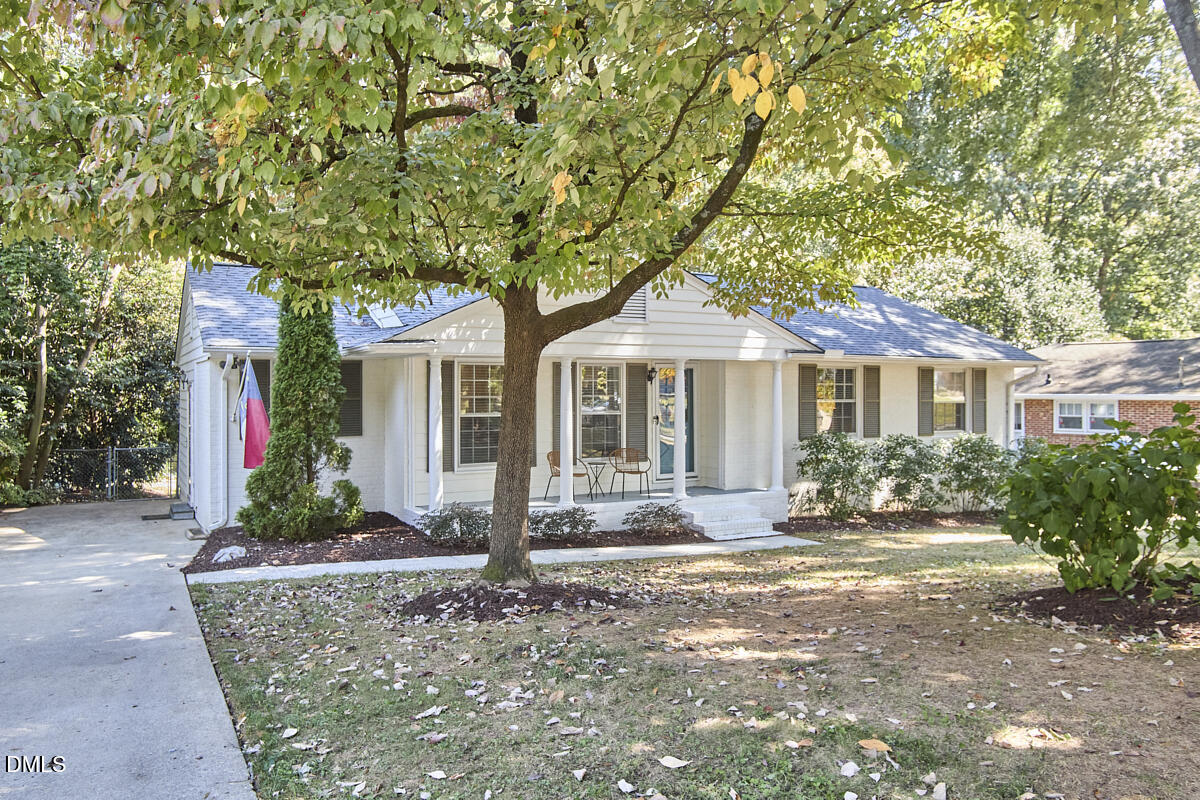 4916 Latimer Road Raleigh, NC 27609 - Photo 2 of 30 a front view of a house with garden