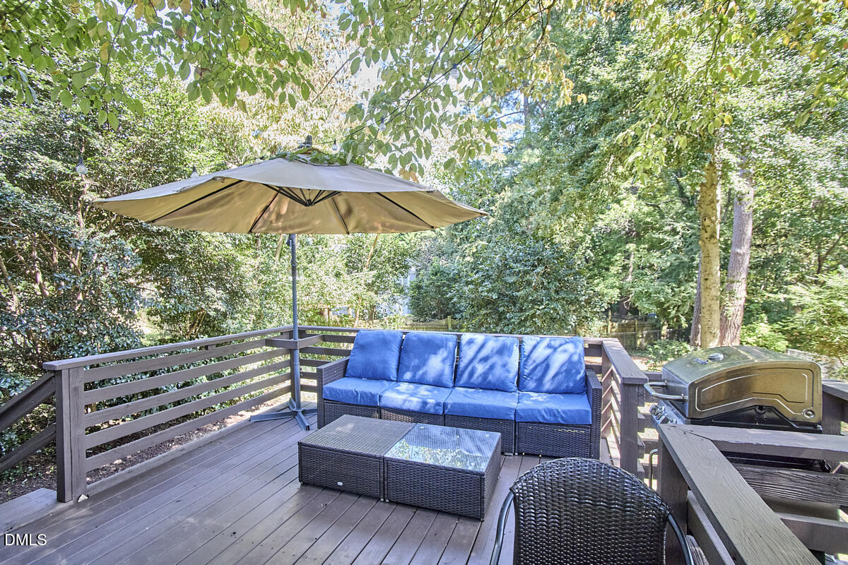 4916 Latimer Road Raleigh, NC 27609 - Photo 24 of 30 a view of sitting area with furniture in back yard