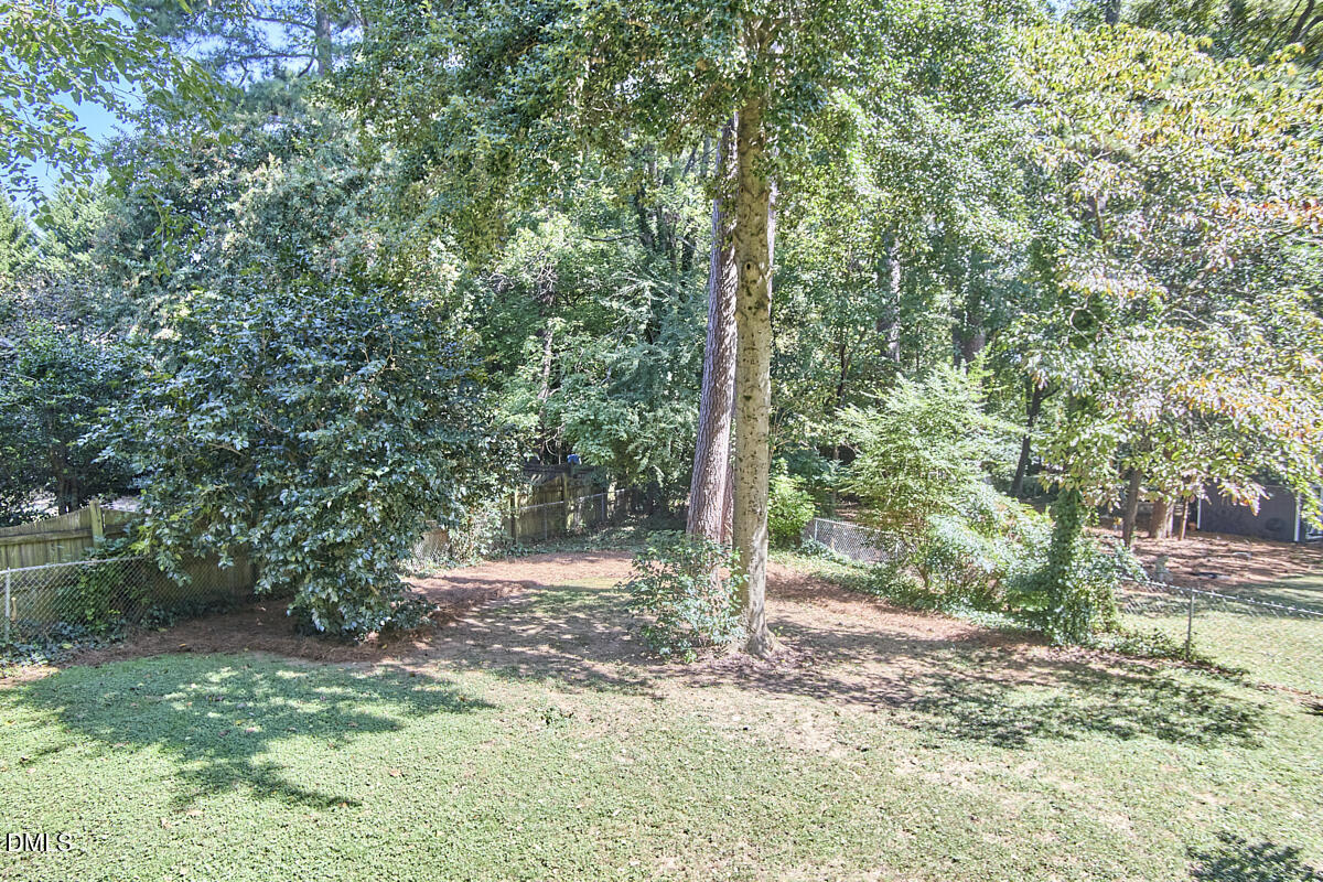 4916 Latimer Road Raleigh, NC 27609 - Photo 27 of 30 a view of a yard with a tree