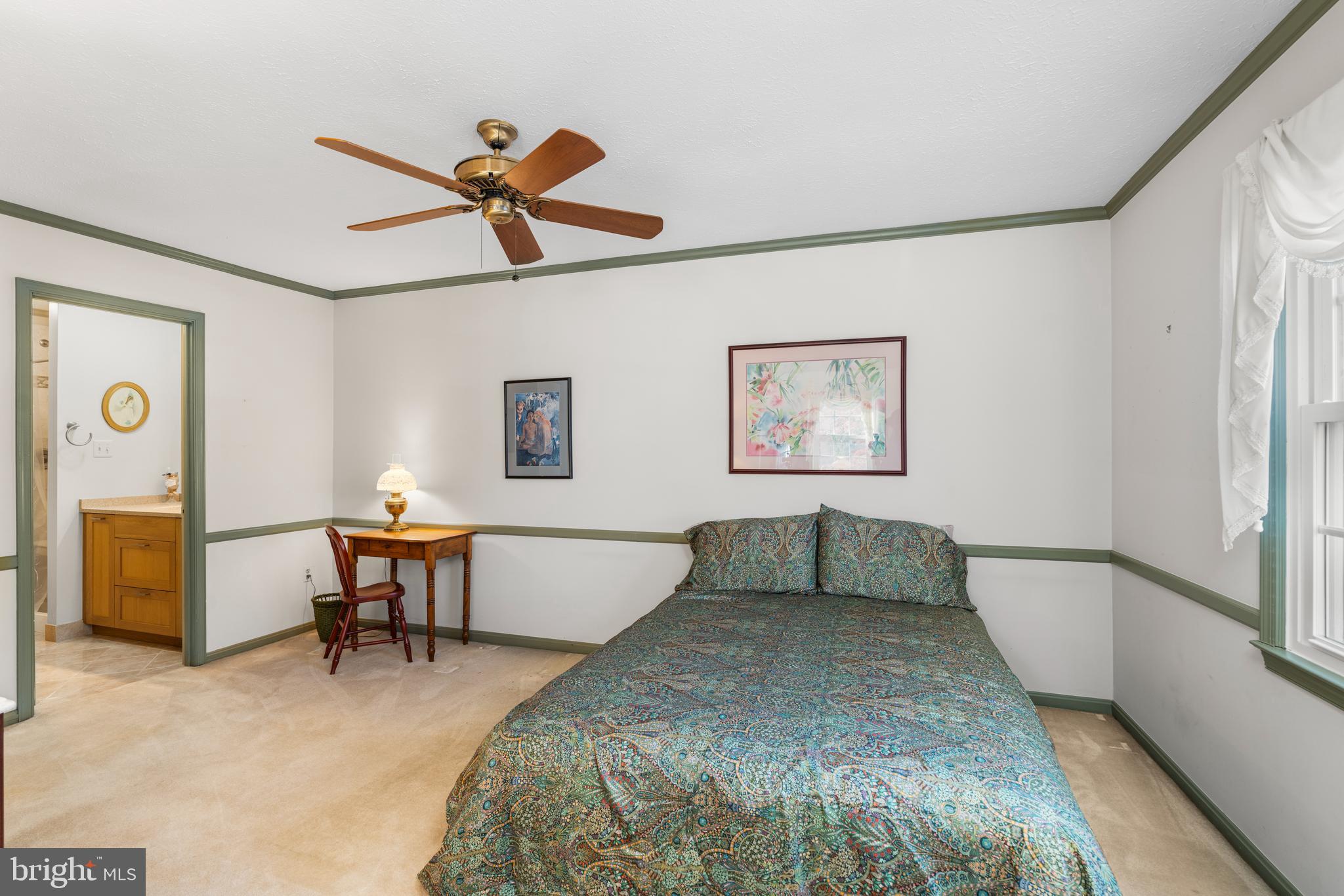 2110 Sandy Court Crofton, MD 21114 - Photo 19 of 50 a bedroom with a bed and a desk