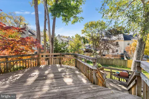 a balcony with wooden floor