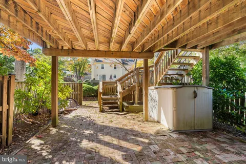 a view of a room with wooden walls