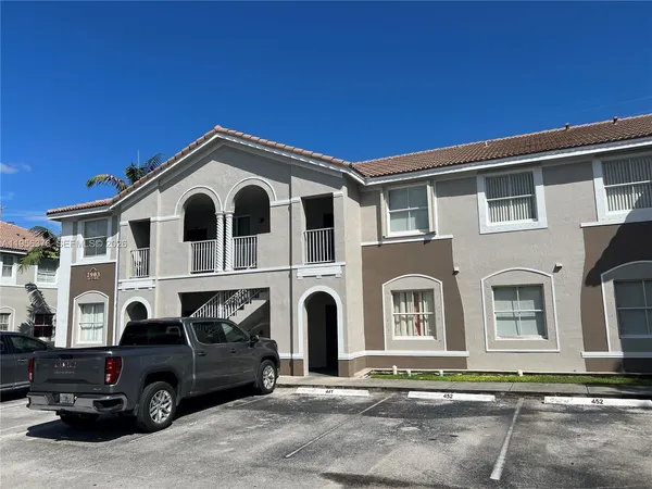 a car parked in front of a house