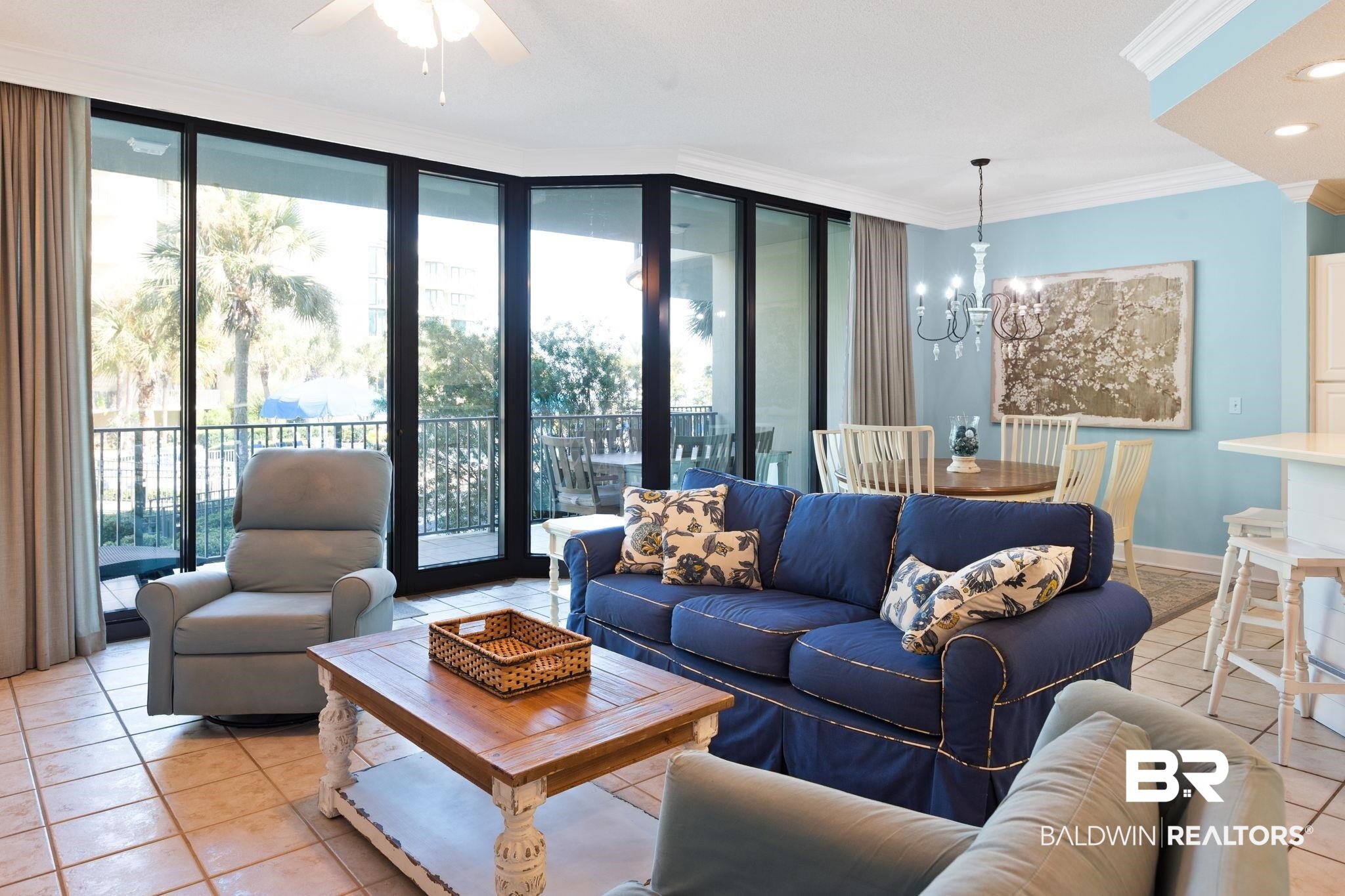 27580 Canal Road, Unit 1112 Orange Beach, AL 36561 - Photo 4 of 50 Living area with light tile patterned floors, ornamental molding, a chandelier, expansive windows, and recessed lighting