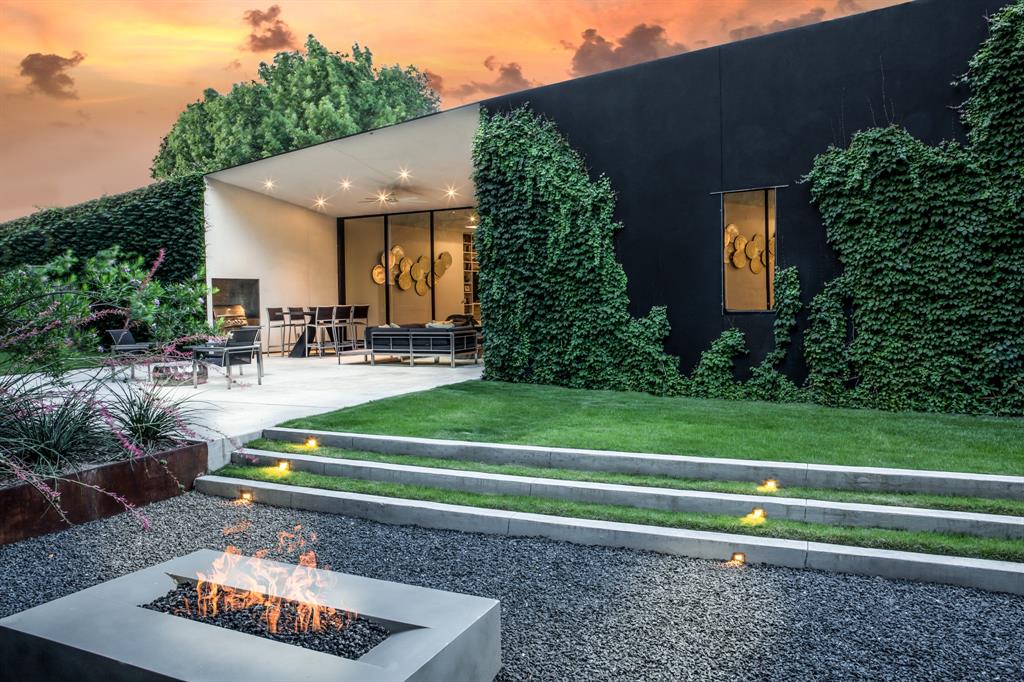 a view of backyard with trampoline