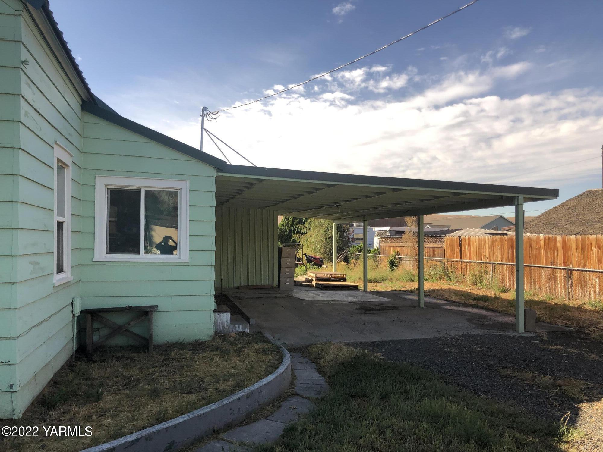 7902-7904 Bell Road Moxee, WA 98936 - Photo 20 of 56 a view of a house with a porch