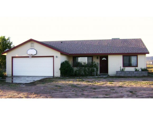 1095 Saddle Road Paulden, AZ 86334 - Photo 1 of 12 a view of a house with a outdoor space