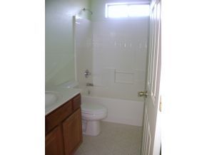 1095 Saddle Road Paulden, AZ 86334 - Photo 3 of 12 a bathroom with a toilet a sink and shower