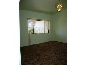 1095 Saddle Road Paulden, AZ 86334 - Photo 10 of 12 a view of an empty room with a window