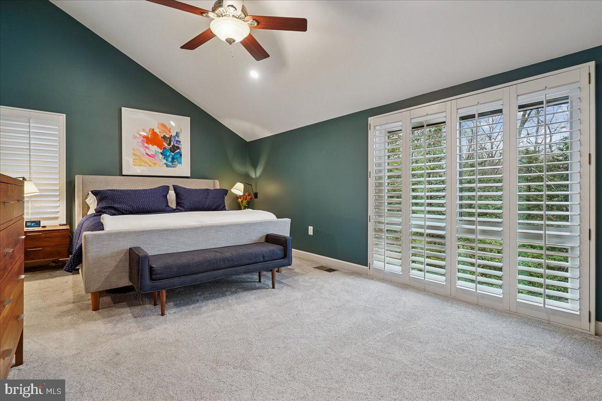 2111 Lirio Court Reston, VA 20191 - Photo 16 of 40 a bedroom with furniture and a large window