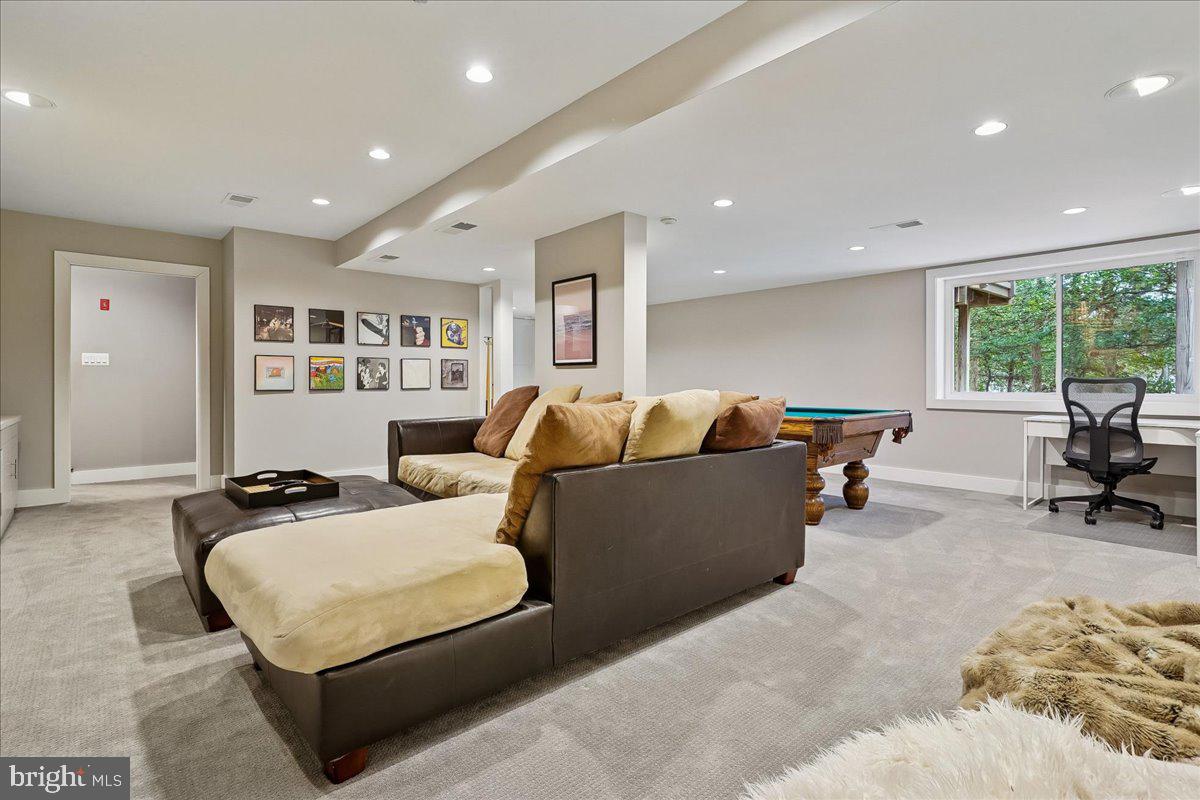 2111 Lirio Court Reston, VA 20191 - Photo 27 of 40 a living room with furniture and large windows