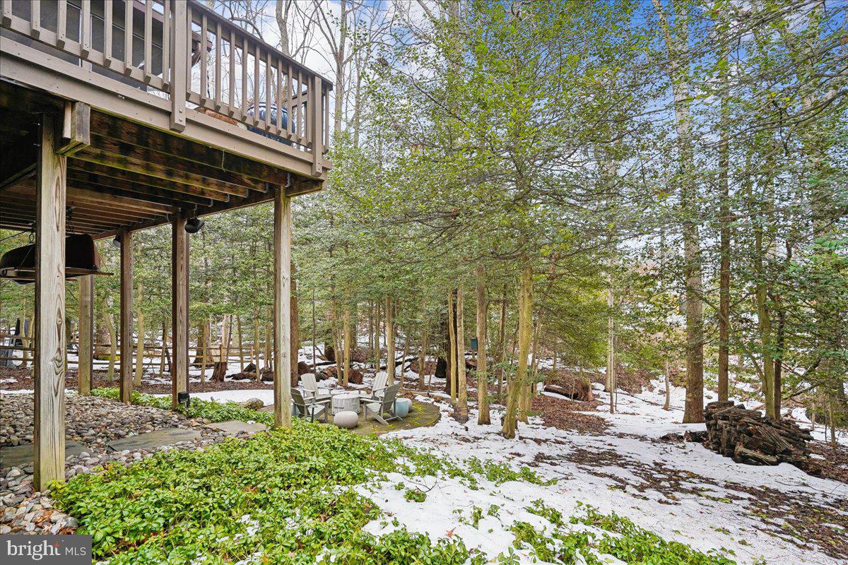 2111 Lirio Court Reston, VA 20191 - Photo 35 of 40 a view of a chair and tables in the patio