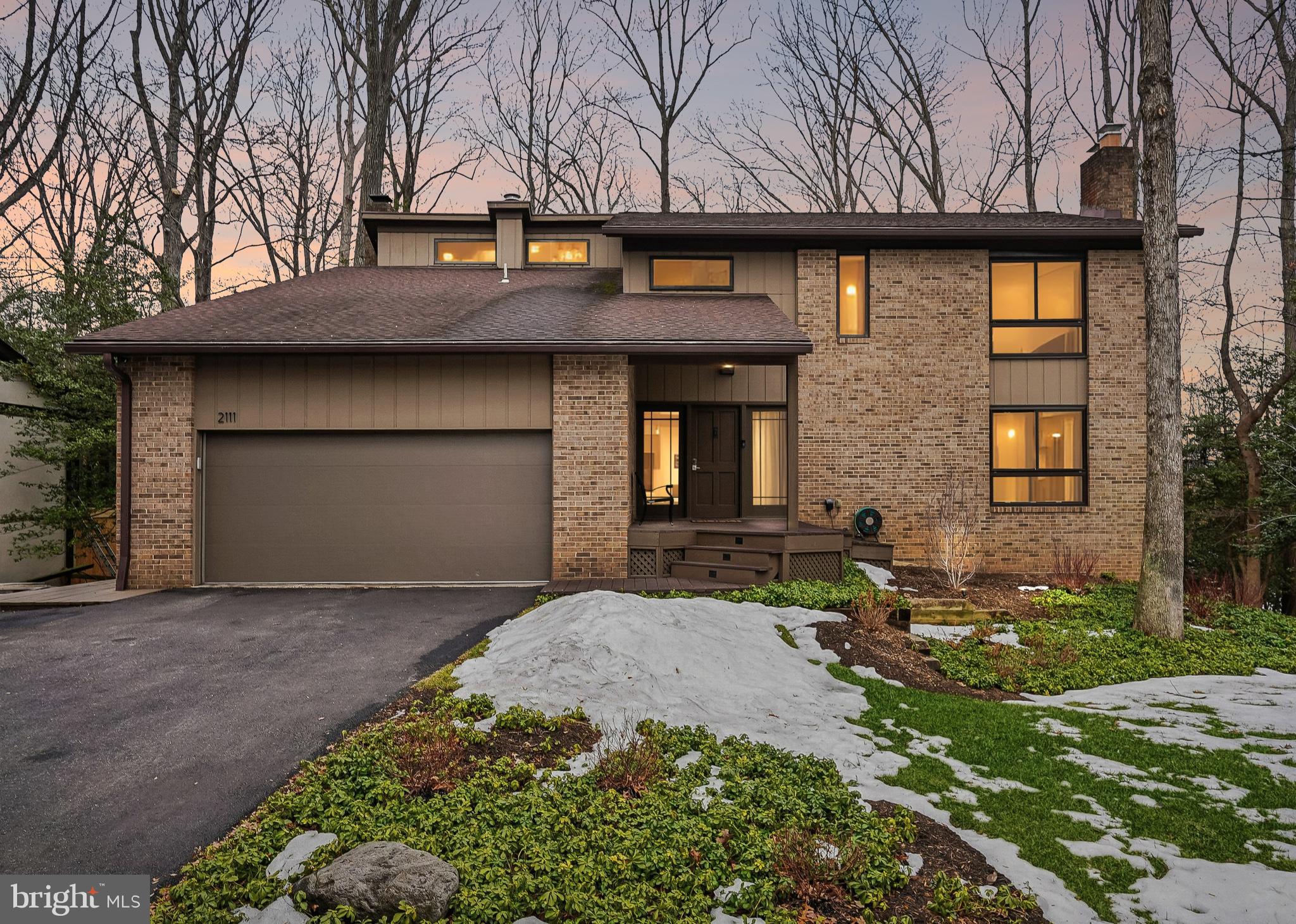 2111 Lirio Court Reston, VA 20191 - Photo 37 of 40 a front view of a house with a yard