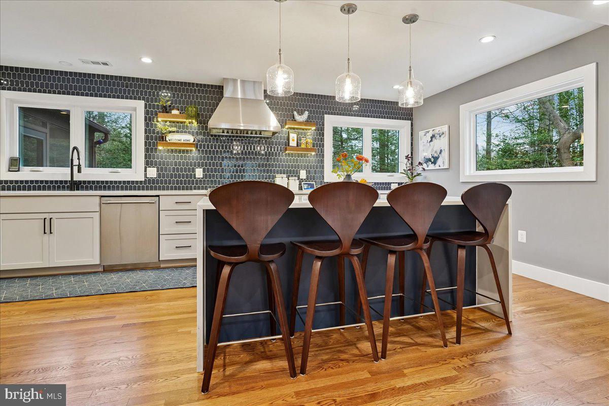 2111 Lirio Court Reston, VA 20191 - Photo 4 of 40 a view of a dining room with furniture window and wooden floor