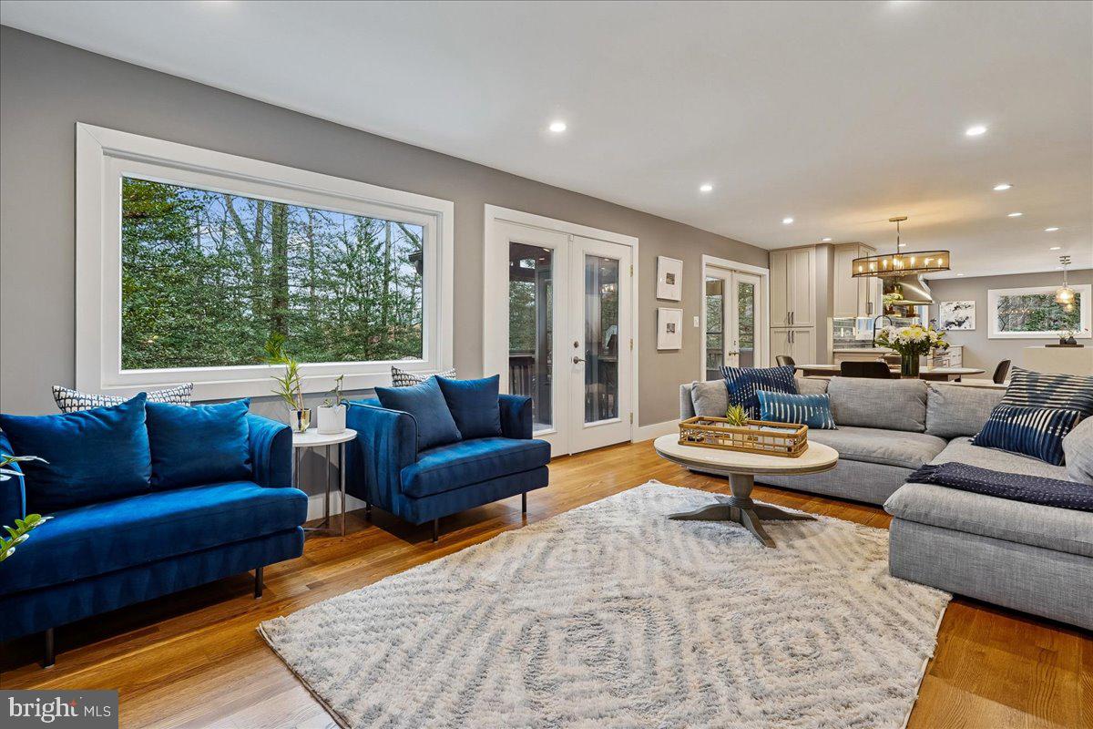 2111 Lirio Court Reston, VA 20191 - Photo 8 of 40 a living room with furniture and a large window