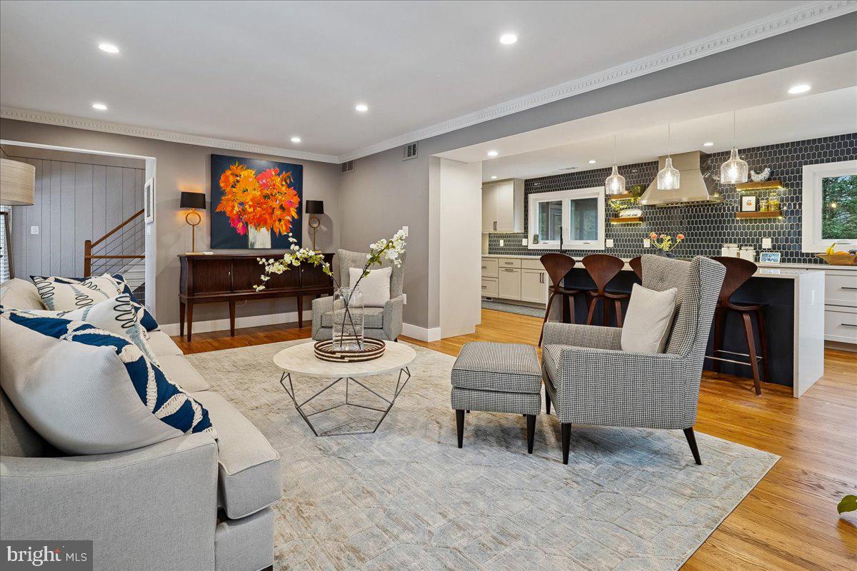 2111 Lirio Court Reston, VA 20191 - Photo 10 of 40 a living room with furniture and a flat screen tv