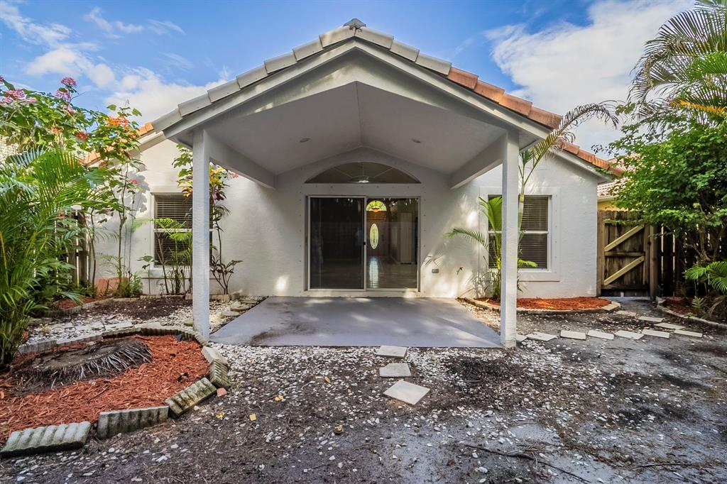 1875 Barnstable Road Wellington, FL 33414 - Photo 26 of 29 a front view of a house