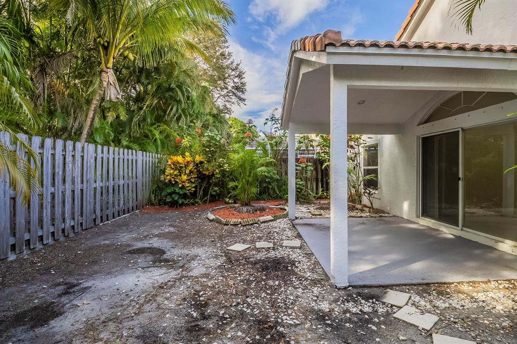 1875 Barnstable Road Wellington, FL 33414 - Photo 28 of 29 a view of a building with pathway