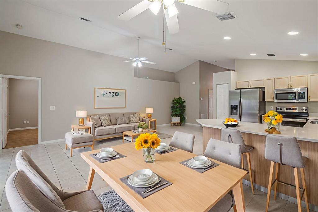 1875 Barnstable Road Wellington, FL 33414 - Photo 4 of 29 a view of a dining room and livingroom view