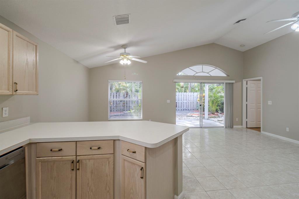 1875 Barnstable Road Wellington, FL 33414 - Photo 10 of 29 a view of a kitchen with a sink and cabinet