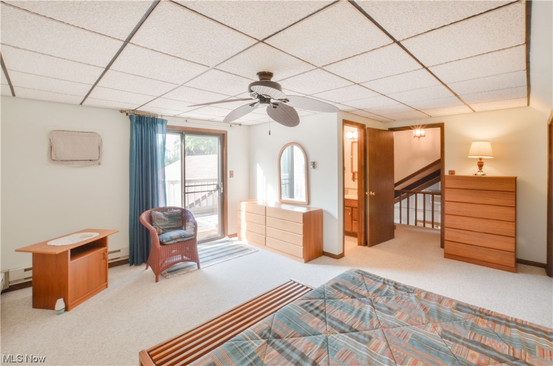 3120 West Elmore Road Port Clinton, OH 43452 - Photo 17 of 27 Bedroom with a baseboard radiator, a drop ceiling, light carpet, and ceiling fan