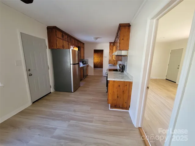 a view of kitchen and living room