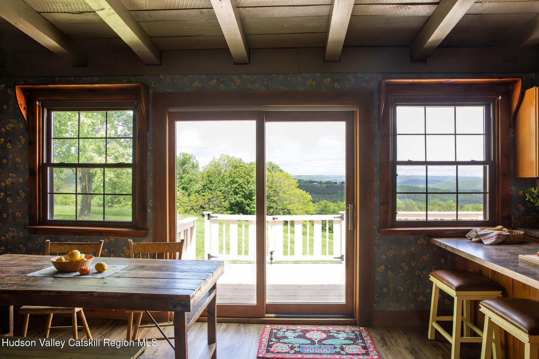 506 Cunningham Road Durham, NY 12422 - Photo 16 of 37 a view of a dining room with furniture window and outside view